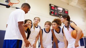 high school basketball players learning sportsmanship