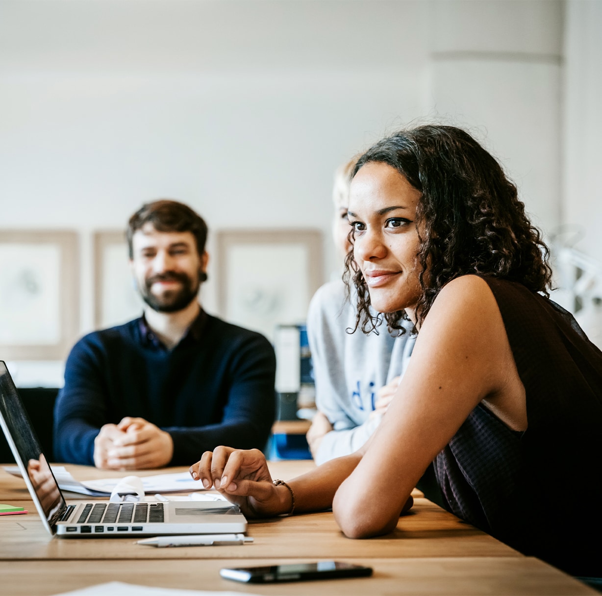 School administration professionals at a conference table.